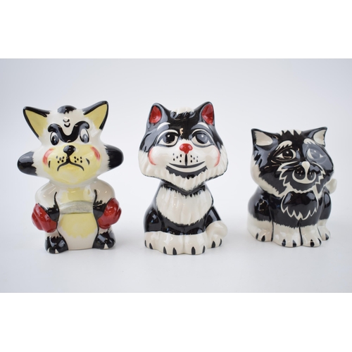 136 - A trio of Lorna Bailey cats to include a thug-like cat with a steel bar and 2 others (3).