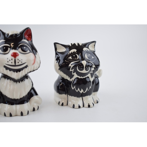 136 - A trio of Lorna Bailey cats to include a thug-like cat with a steel bar and 2 others (3).