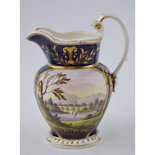 145 - Early 19th century porcelain jug decorated with an estate scene including a lake scene, probably Der... 