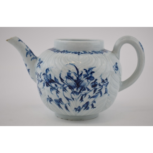 156 - An 18th century blue and white porcelain Worcester feather moulded floral pattern teapot, c. 1760.