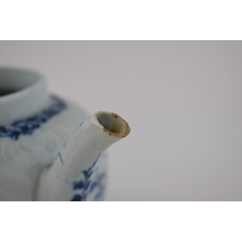 156 - An 18th century blue and white porcelain Worcester feather moulded floral pattern teapot, c. 1760.