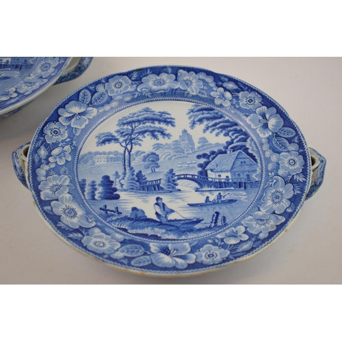 158 - A pair of early 19th century blue and white transfer-printed Wild Rose pattern hot water plates, c. ... 