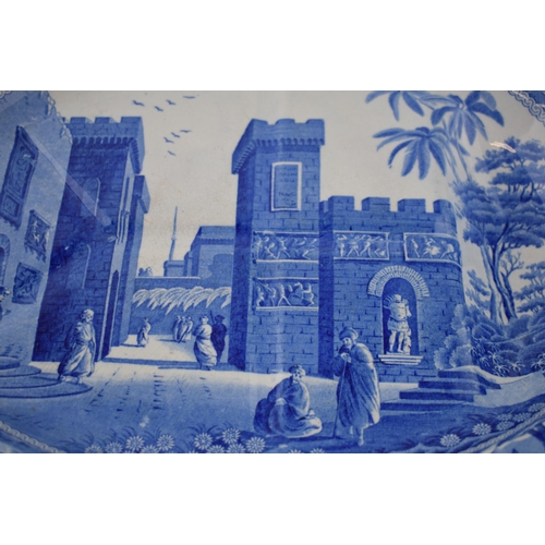 167 - An early 19th century blue and white transfer-printed Spode Caramanian series large well and tree pl... 