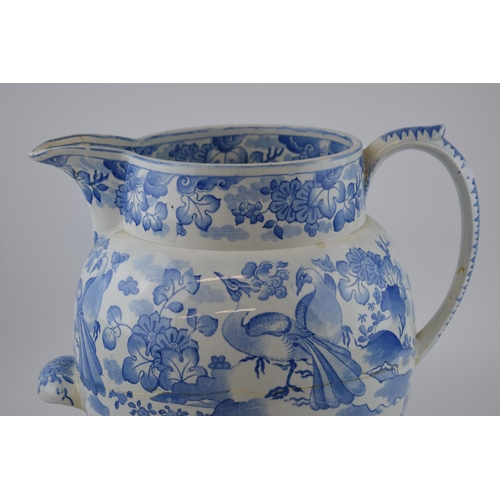 168 - An early 19th century blue and white transfer-printed Spode Old Peacock pattern footbath jug, c. 182... 