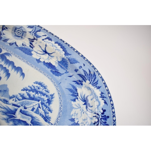 174 - An early 19th century blue and white transfer-printed Leopard and Antelope pattern large platter, c.... 