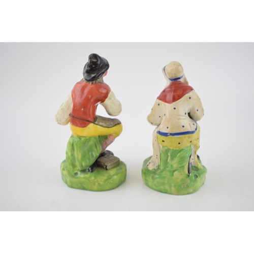 184 - A pair of early 19th century Staffordshire pearlware figures of Jobson and Nell (Cobler & Wife), c. ... 