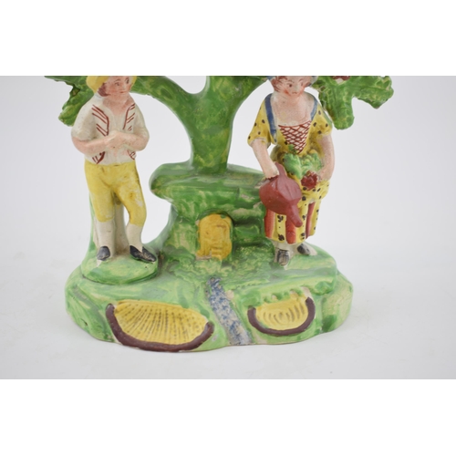 192 - An early 19th century Staffordshire pearlware bocage figure of lady and gentleman gardeners, c. 1820... 