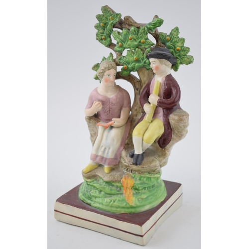 195 - An early 19th century Staffordshire pearlware bocage figure of songstress and gentleman piper on squ... 