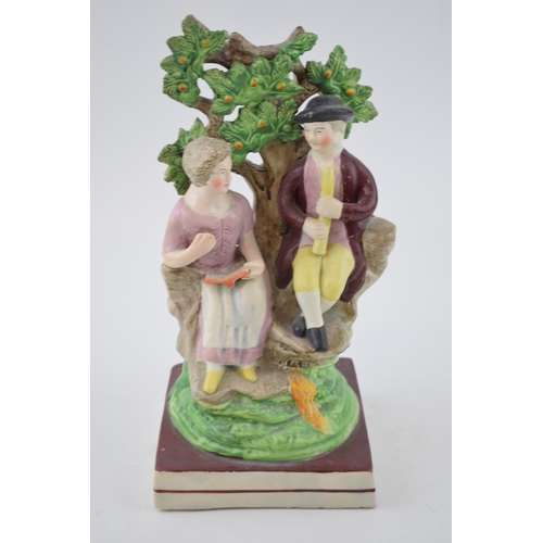 195 - An early 19th century Staffordshire pearlware bocage figure of songstress and gentleman piper on squ... 