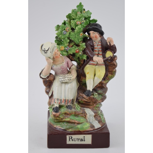 197 - An early 19th century Staffordshire pearlware bocage figure of songstress and gentleman musician, ti... 