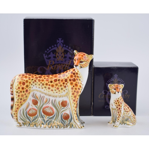 71 - Two Royal Crown Derby paperweights, Cheetah, 14cm high and Cheetah Cub, 7.7cm, gold stoppers, red pr... 