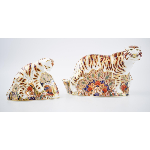 72 - Two Royal Crown Derby paperweights, Bengal Tiger, H:13cm and a Bengal Tiger Cub, H:10cm, red printed... 