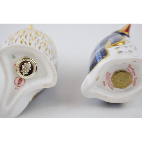 74 - A Royal Crown Derby paperweight, Puffin, date code for 1996 (LIX) and Rockhopper Penguin, 21st year ... 