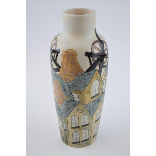 77 - Burslem Pottery high shouldered vase with a potteries mining scene, 25cm tall.