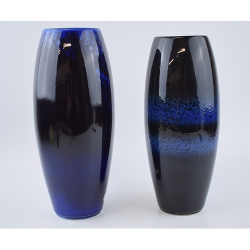 93 - A near pair of Alan Clarke Studio vases with abstract design, 30cm tallest (2).