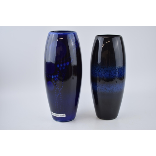 93 - A near pair of Alan Clarke Studio vases with abstract design, 30cm tallest (2).