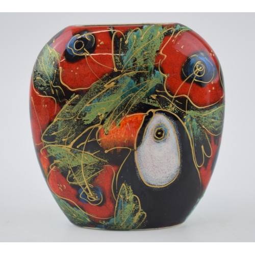 95 - Anita Harris Art Pottery purse vase, decorated with a toucan and poppies, 12cm tall, signed by Anita... 