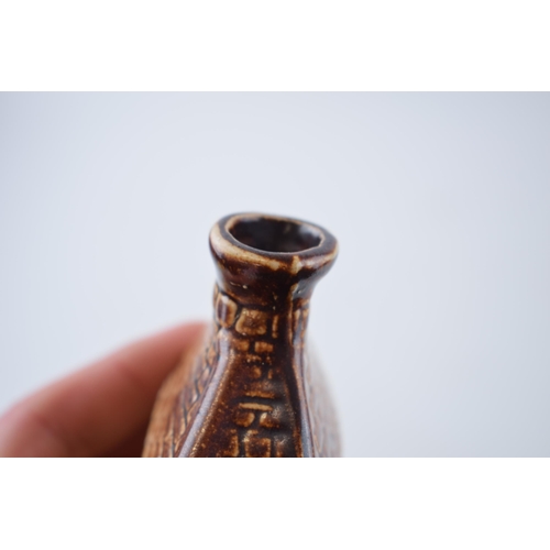 202 - Stoneware bottle in the form of house, chimney rises to form bottle neck. Inscribed E R to base. Hei... 