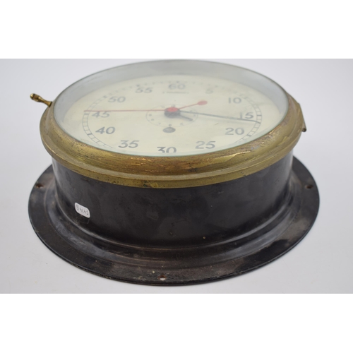 208 - Marine bulkhead clock with military crowsfoot marked to the reverse A.P.727 A.C.O/R/12/59. Painted b... 