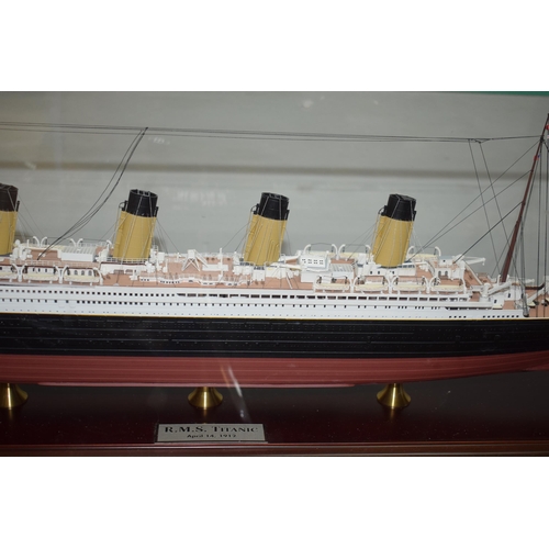 210 - Hand made model of the White Star Line passenger liner Titanic. Detailed scale model housed in a gla... 