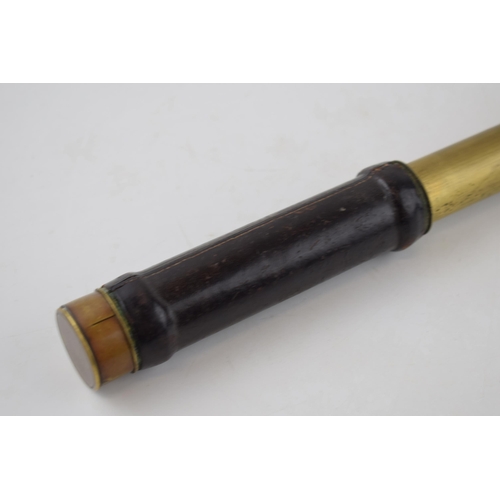 211 - Pocket-sized brass telescope with leather grip. Brass cover to eye-piece. Inscribed 'Charles Pearson... 