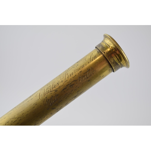 211 - Pocket-sized brass telescope with leather grip. Brass cover to eye-piece. Inscribed 'Charles Pearson... 