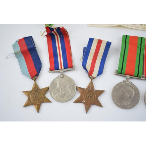 218 - A collection of World War Two medals to include The Defence Medal, the 1939-1945 medal, The France a... 