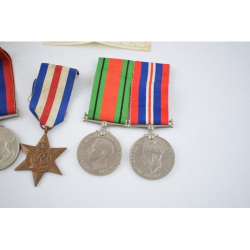 218 - A collection of World War Two medals to include The Defence Medal, the 1939-1945 medal, The France a... 