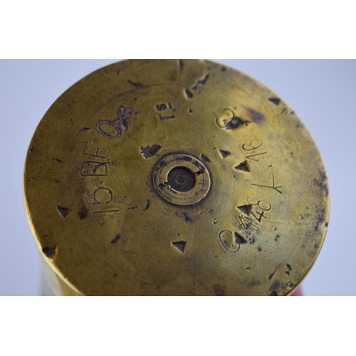 226 - A WWI trench art brass French shell case Diameter 8cm, Height 35cm, together with another French exa... 