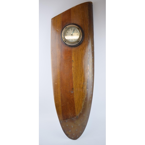 231 - WWII Propellor tip with brass edging with Smiths P H 23,481 clock. Wall mountable. Length 76cm, widt... 