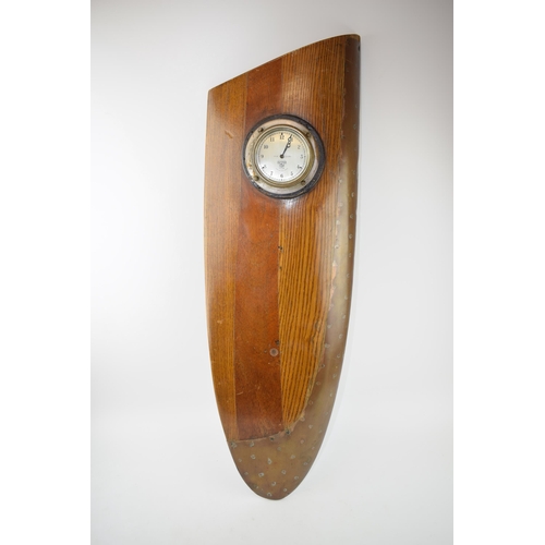 231 - WWII Propellor tip with brass edging with Smiths P H 23,481 clock. Wall mountable. Length 76cm, widt... 