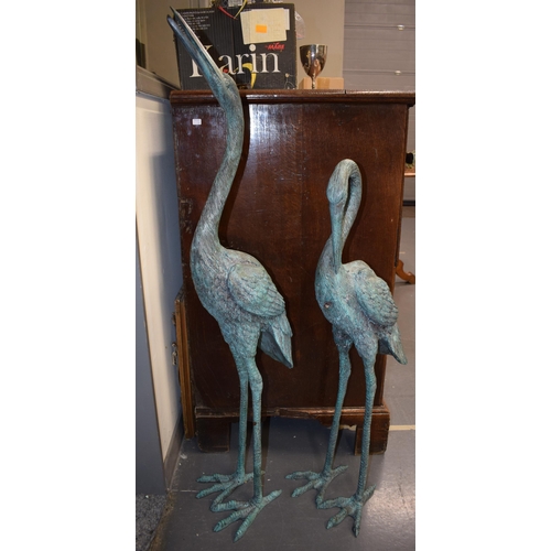 235 - An extra large pair of bronze-effect Japanese style storks, with weathered effect, tallest 109cm tal... 