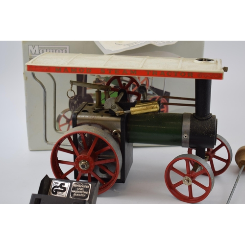 248 - Boxed Mamod steam engine / steam tractor, in original box, with accessories.