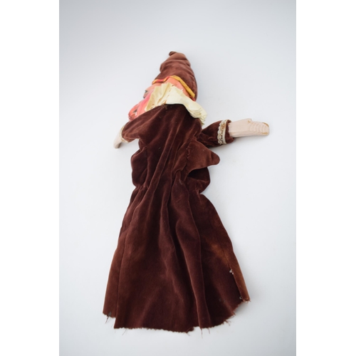 249 - An early 20th century naive plaster hand puppet in the form of Mr Punch in velvet dress with wooden ... 