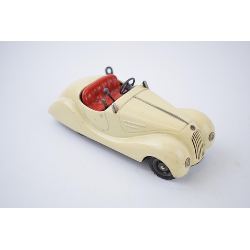 251 - Boxed Schuco Examico 4001 tin toy clockwork car. With four working gears and reverse. Original Schuc... 