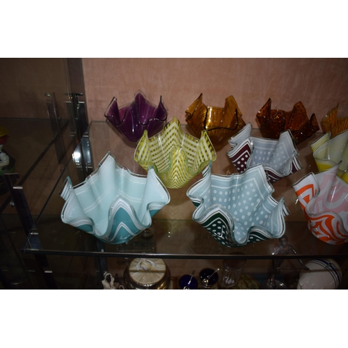 258 - A collection of Chance Pilkington Handkercheif glass vases in varying colours, some with original go... 