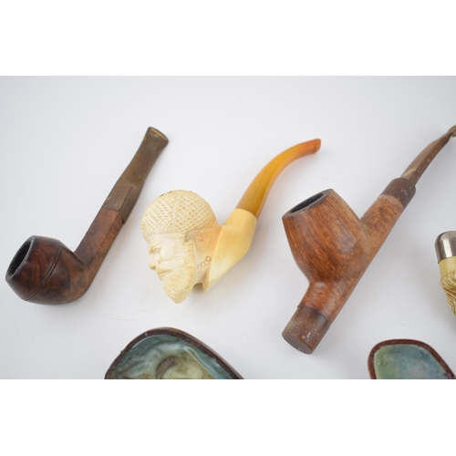 267 - Smoking Interest: a collection of smoking pipes to include a cased meerschaum example, another simil... 