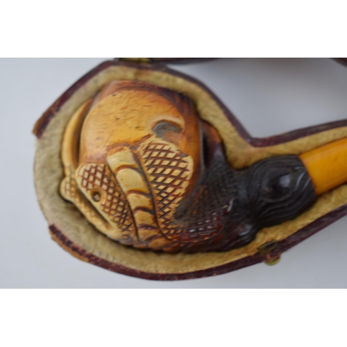 268 - Cased early 20th century meerschaum smoking pipe in the form of a ball and claw with amber handle, i... 