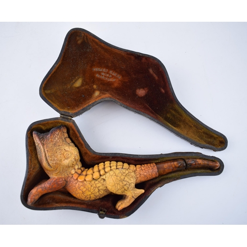 269 - Cased Victorian meerschaum pipe in the form of a grotesque animal, perhaps a gator, in original fitt... 