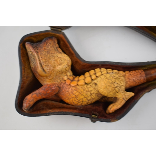 269 - Cased Victorian meerschaum pipe in the form of a grotesque animal, perhaps a gator, in original fitt... 