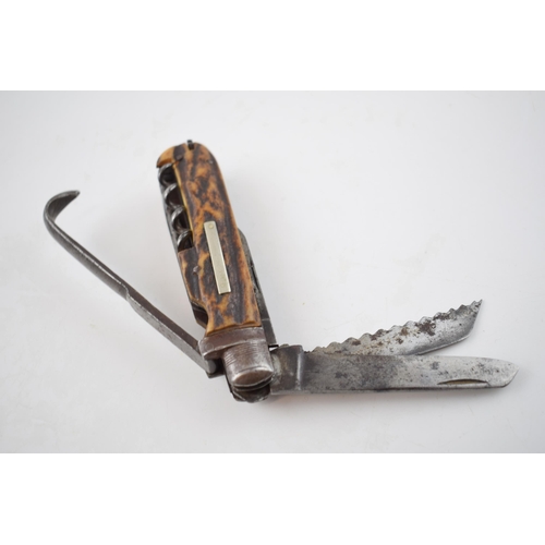 275 - Victorian coachman's pocket knife with blade, saw and corkscrew etc, Sheffield, 11.5cm long.