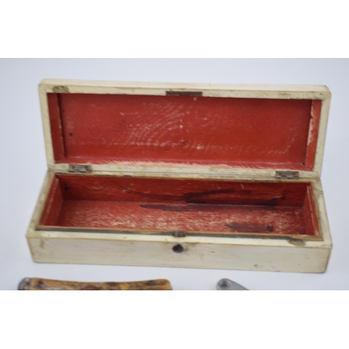 276 - An early 20th century wooden box containing a bone handled Saynor Sheffield pruning pocket knife tog... 