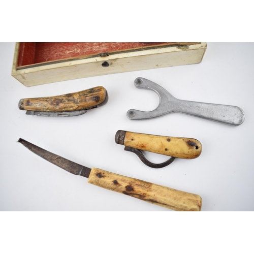 276 - An early 20th century wooden box containing a bone handled Saynor Sheffield pruning pocket knife tog... 