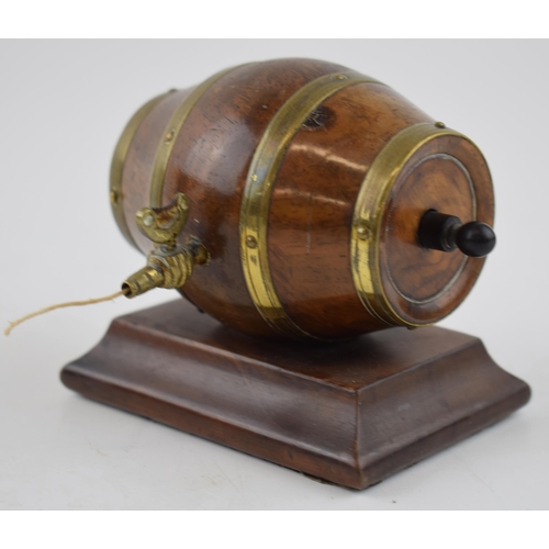 277 - Late 19th / early 20th century string dispenser in th form of a cooper barrel, brass fixtures, on wo... 