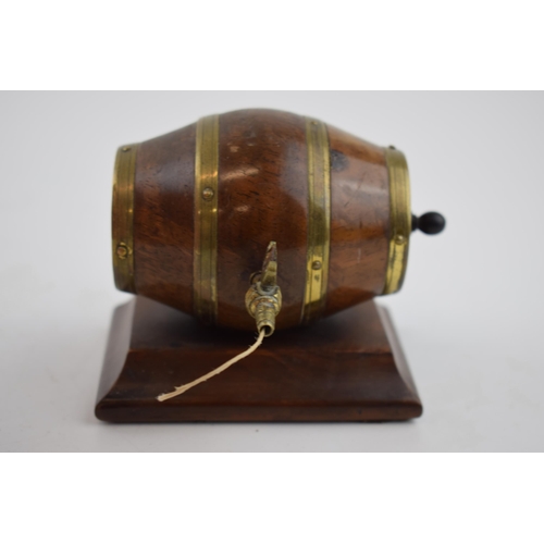 277 - Late 19th / early 20th century string dispenser in th form of a cooper barrel, brass fixtures, on wo... 