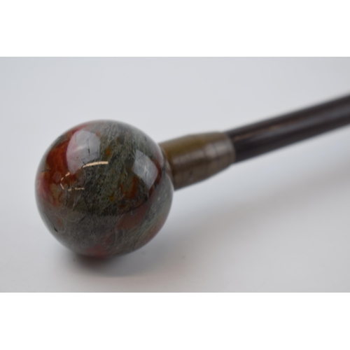 279 - 19th century walking cane with moss agate orb handle, brass mount and original brass ferrel. Length ... 