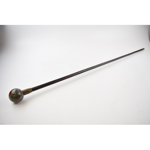 279 - 19th century walking cane with moss agate orb handle, brass mount and original brass ferrel. Length ... 