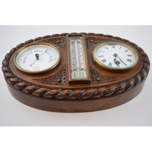 285 - Early 20th century wall hanging barometer clock with central thermometer, bevelled glass, in carved ... 