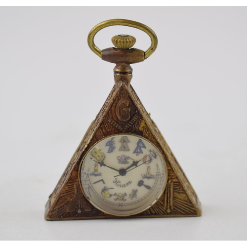 288 - Bronze style Masonic triangular clock, with top wind, 6.5cm tall, in working order, modern.