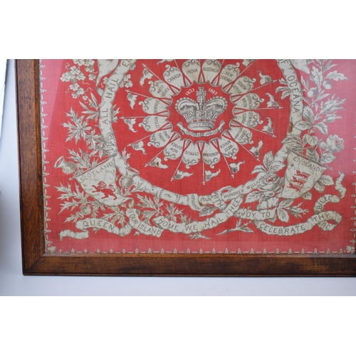 335 - A framed commemorative cloth celebrating Queen Victoria's Golden Jubilee. Victoria crown to centre w... 